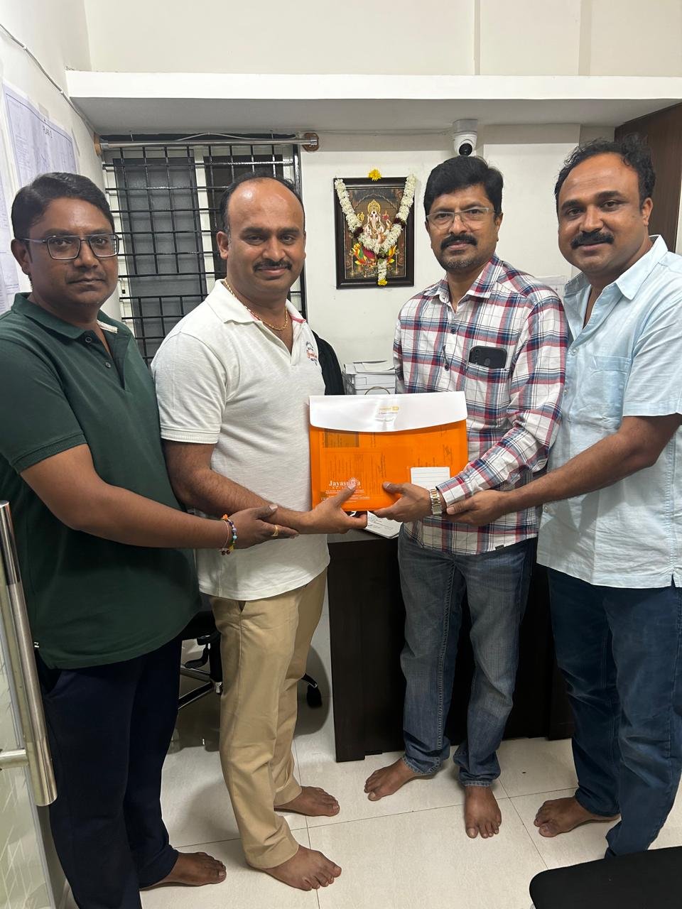 Group Celebration with Proud Plot Owner